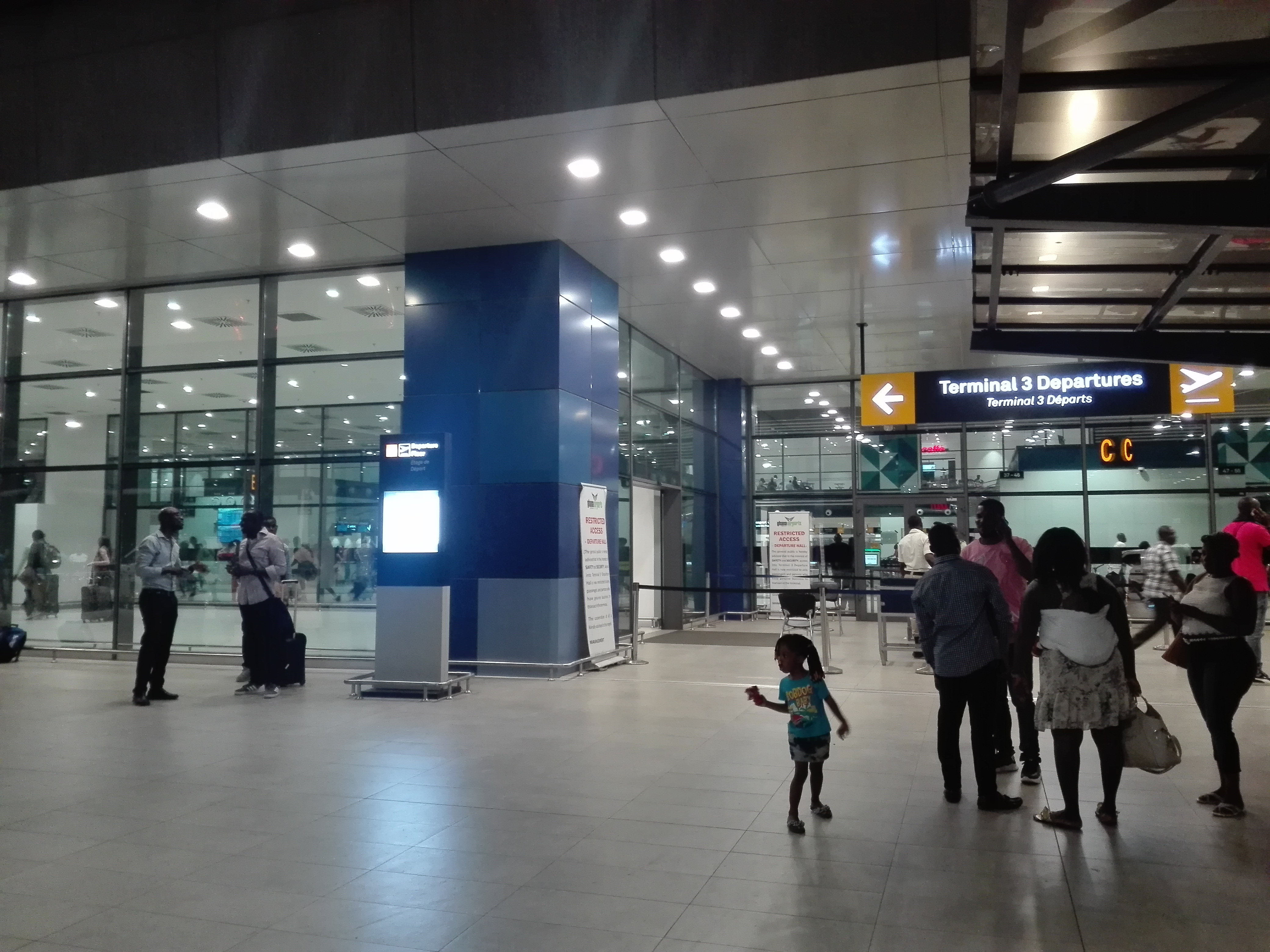 Terminal 3 departure level of Accra International Airport at night