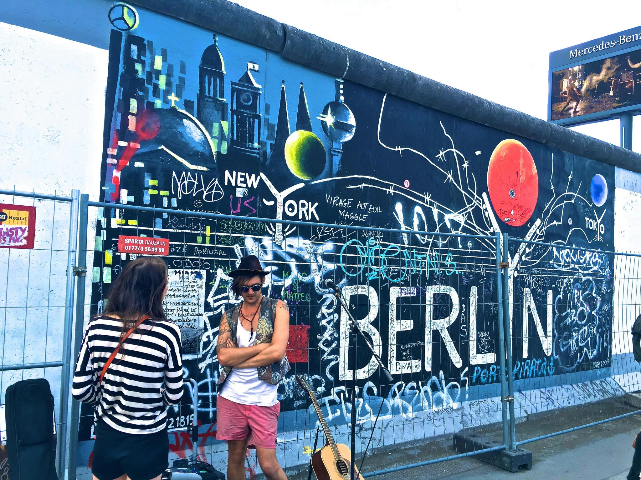 Colourful street art painted on a surviving section of the Berlin Wall